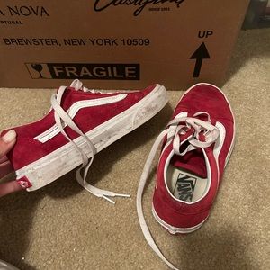Red Vans size 6.0. Worn a few times. Too small.